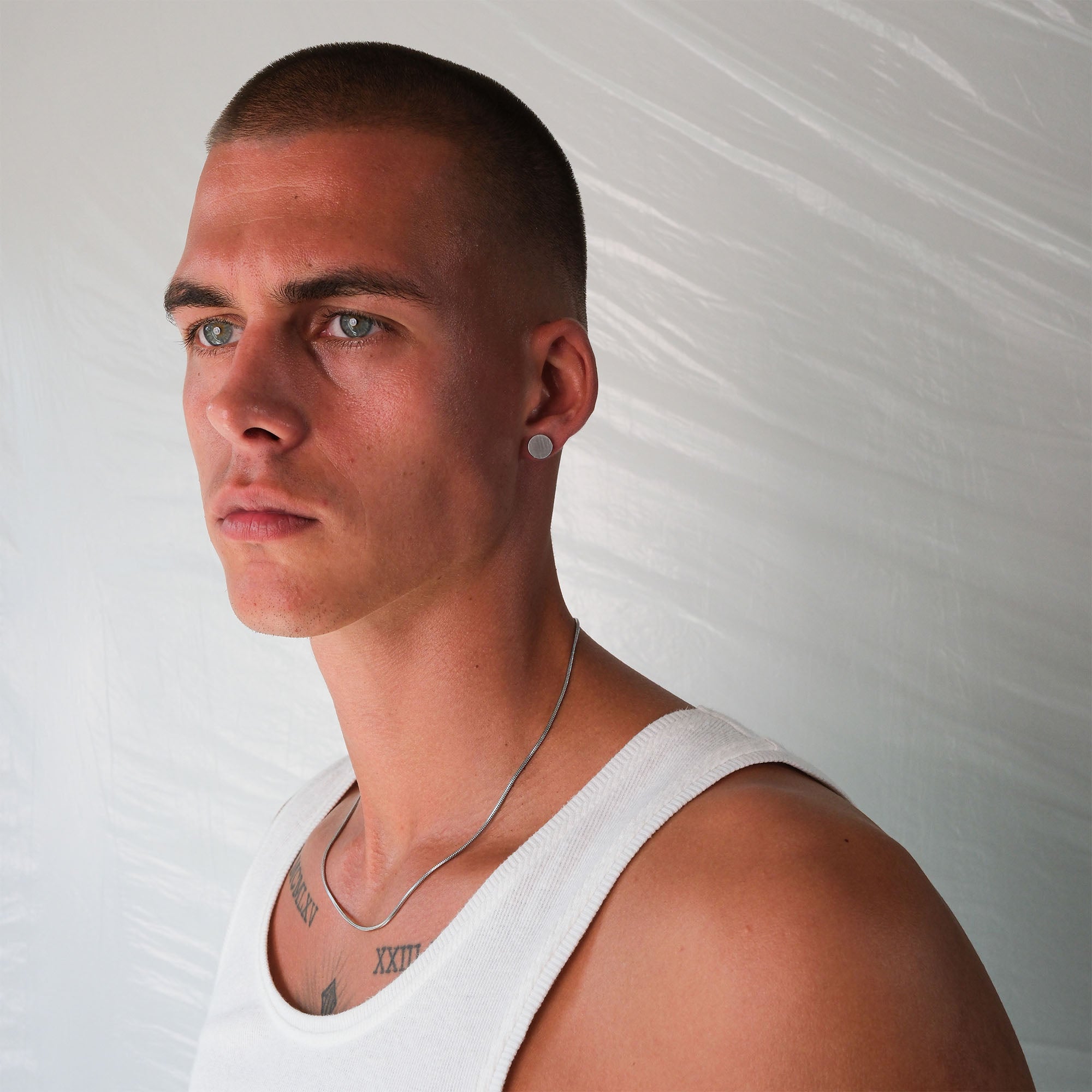 K12 - SILVER STEEL STUD EARRING